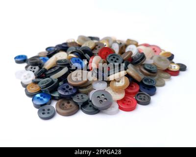 boutons de vêtements sur fond blanc Banque D'Images