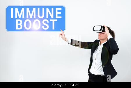 Signe d'écriture de la main Immunite Boost. Concept d'affaires être capable de résister à une maladie particulière empêchant le développement de pathogènes Banque D'Images