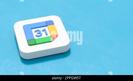 Icône Google Agenda sur fond bleu avec espace de copie Banque D'Images