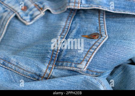 Détail de texture denim usé bleu close up. Banque D'Images