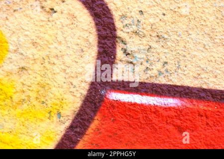 Des lignes et des formes colorées vaporisent sur un mur Banque D'Images