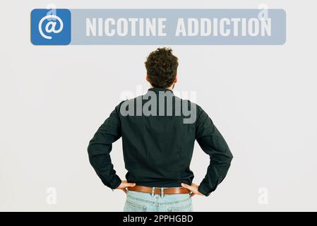 Signe écrit à la main addiction à la nicotine. Photo conceptuelle condition d'être accro au tabagisme ou à la consommation de tabac Banque D'Images