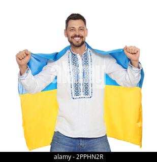 Homme heureux dans les vêtements nationaux ukrainiens avec drapeau de l'Ukraine sur fond blanc Banque D'Images