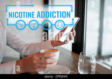 Signe écrit à la main addiction à la nicotine. Condition de vitrine d'affaires d'être accro à la consommation de tabac ou de tabac Banque D'Images