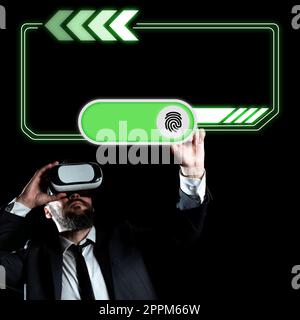 Homme d'affaires portant des lunettes VR et pointant sur des messages importants avec un doigt. Homme ayant des lunettes de réalité virtuelle et montrant des informations crutiales. Banque D'Images