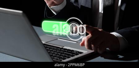 Homme d'affaires en costume de bureau assis à la table fourmi tapant message important avec ordinateur portable. Design numérique futuriste avec lueur colorée présentant les actualités techniques. Banque D'Images