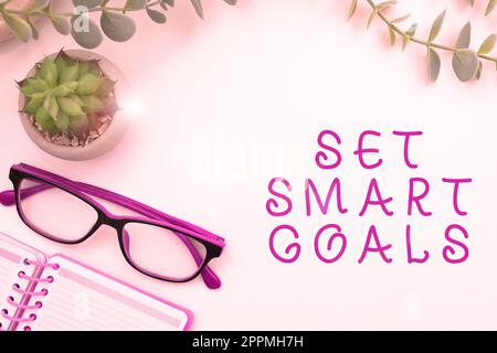 Texte d'écriture définir les objectifs intelligents. Concept d'entreprise établir des objectifs réalisables établir de bons plans d'affaires Banque D'Images
