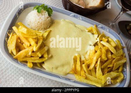 Entrecote de bœuf avec sauce crémeuse Banque D'Images