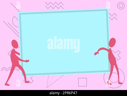 Deux collègues debout portant un grand tableau blanc montrant Unity. Banque D'Images