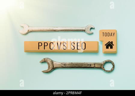 Légende conceptuelle PPC vs Seo. Business idée Pay Per Click Against Search Engine Optimization stratégies -48568 Banque D'Images