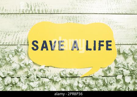Inspiration montrant l'enseigne Save A Life. Aperçu de l'entreprise aide aide sauver quelqu'un d'un problème médical ou d'une blessure bulle de parole avec des informations importantes écrites dans le papier enroulés sous. Banque D'Images