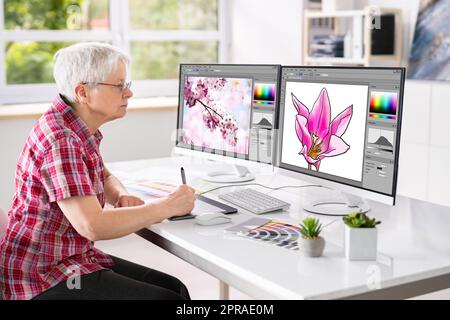 Web Graphic Designer travaillant dans Office Banque D'Images
