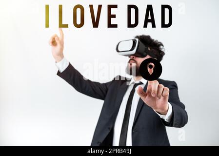 Légende conceptuelle J'aime papa. Concept d'affaires bons sentiments au sujet de mon père affection affectueuse bonheur Homme portant des lunettes VR et pointant sur des messages importants avec les deux mains. Banque D'Images