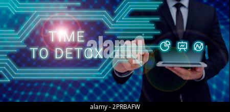 Temps de signature d'écriture à la main pour Detox. Mot écrit sur le moment pour l'alimentation Nutrition santé traitement de toxicomanie nettoyer l'homme tenant le comprimé et le stylo qui points sur le graphique et la présentation de nouvelles idées. Banque D'Images