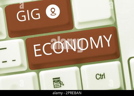 Légende conceptuelle Gig Economy, Business concept un système de marché qui se distingue par les emplois et les contrats à court terme Banque D'Images