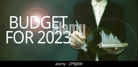 Rédaction affichant le texte Budget pour 2023An estimations écrites des recettes et des dépenses pour 2023. Idée d'affaires une estimation écrite des recettes et des dépenses pour 2023 Banque D'Images