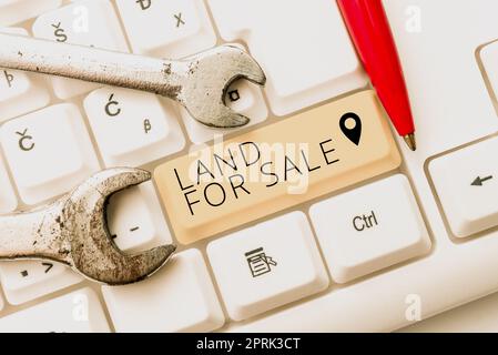 Signature d'écriture à la main Land for sale, vue d'ensemble d'affaires Immobilier Lot vendre des développeurs Realtors investissement Banque D'Images