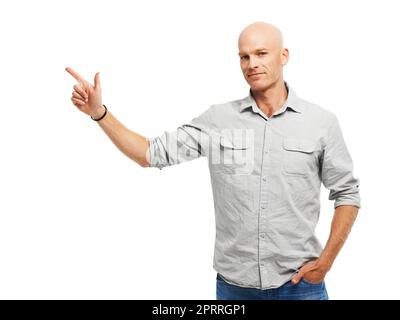 Vivre son style de vie. Studio photo d'un beau jeune homme isolé sur blanc. Banque D'Images