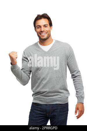 Vivre son style de vie. Studio photo d'un beau jeune homme isolé sur blanc. Banque D'Images