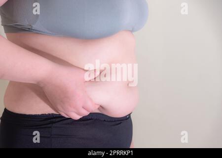 Femme gras, façonner un muscle sain d'estomac, et le mode de vie de régime Banque D'Images