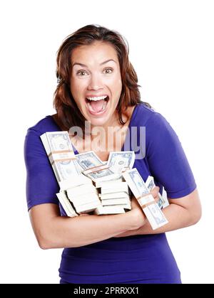 Je ne peux pas croire que j'ai gagné. Portrait studio d'une femme dans sa mi-30s regardant excitée tout en tenant des piles de monnaie papier Banque D'Images