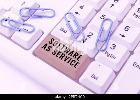 Écriture de texte affichant le logiciel en tant que service. Concept signifiant à la demande sous licence sur abonnement et hébergé de manière centralisée Banque D'Images