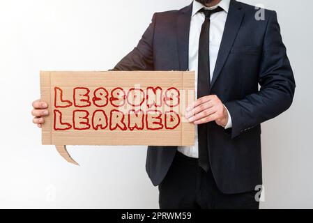 Exposé conceptuel leçons LearnedPromote partager et utiliser les connaissances issues de l'expérience. Concept sens promouvoir le partage et l'utilisation des connaissances issues de l'expérience Banque D'Images