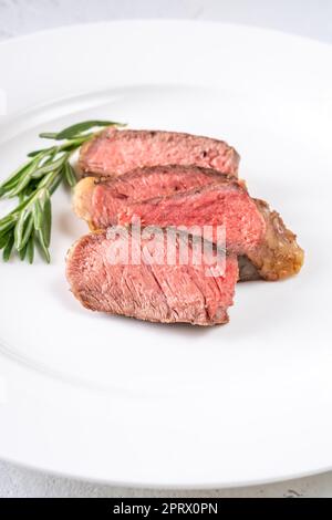 Steak de bœuf en tranches Banque D'Images