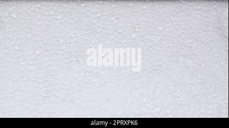 La mousse de polystyrène blanc de haute qualité, texture background en styromousse, gros plan d'une surface blanche poreuse Banque D'Images