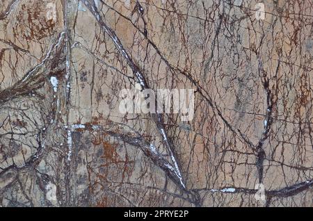 La texture d'une dure et lisse en surface avec des points aléatoires et les défauts caractéristiques des peuplements naturels en pierre de marbre ou de granit Banque D'Images