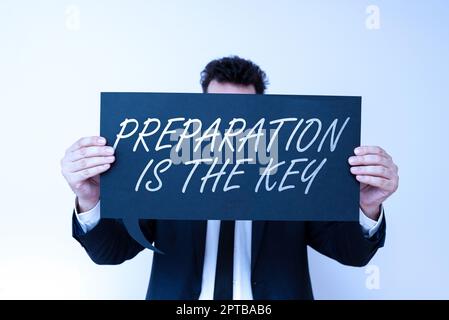 La préparation de l'affiche à la main est la clé, l'action de photo conceptuelle de faire quelque chose prêt pour le service ou l'utilisation Banque D'Images