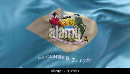 Vue rapprochée du drapeau de l'État du Delaware qui agite dans le vent. Le Delaware est un État de la région du Mid-Atlantic des États-Unis. Tissu texturé dans le dos Banque D'Images