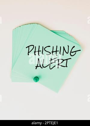 Affiche affichant une alerte de phishing, mot écrit sur Aware to frauduleuse tentative d'obtenir des informations sensibles Banque D'Images