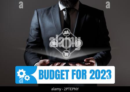 Affiche textuelle montrant le budget pour 2023, Business présente une estimation écrite des recettes et des dépenses pour 2023 Banque D'Images