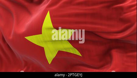 Vue rapprochée du drapeau national du Vietnam qui agite dans le vent. La République socialiste du Vietnam est un pays d'Asie du Sud-est. Tissu texturé Banque D'Images