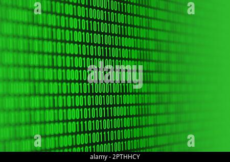 Une image d'un code binaire composé d'une série de chiffres verts sur fond noir Banque D'Images