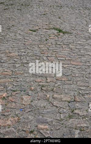 La texture est très vieux et aménagé de façon inexacte faite de pavés de pierres de différentes formes de secours Banque D'Images