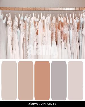 Palette de couleurs adaptée à la photo de robes de mariage dans la boutique sur le rack dans la chambre Banque D'Images