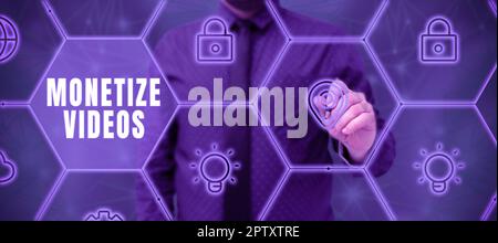 L'écriture manuelle signe monetize vidéos, Word pour le processus de gagner de l'argent à partir de vos vidéos YouTube téléchargées Banque D'Images