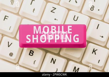 Légende de texte présentant Mobile Shopping, concept signifiant commerce de biens et de services par le biais d'appareils sans fil Banque D'Images
