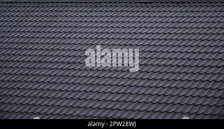 La texture du toit de métal peint. Close-up vue détaillée de toiture de toit en pente. Couverture de haute qualité Banque D'Images