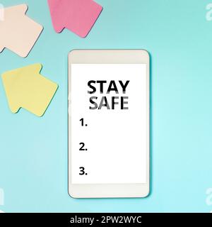 Texte manuscrite Restez en sécurité, approche commerciale à l'abri de toute menace de danger, de tout dommage ou de tout endroit où conserver les articles Banque D'Images