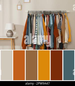 Palette de couleurs adaptée à la photo des vêtements élégants pour femmes sur le rack dans la chambre Banque D'Images