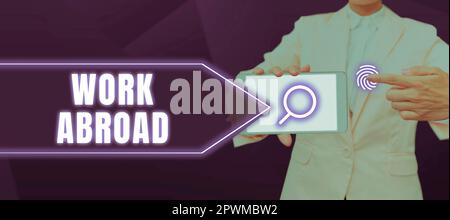 Écriture affichage de texte travail à l'étranger, Word écrit sur immergé dans un environnement de travail étranger travail outre-mer non local Banque D'Images