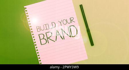 Affiche de texte montrant construire votre marque, Business concept faire une identité commerciale Marketing Publicité Banque D'Images
