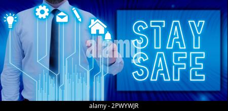 Texte d'écriture Restez en sécurité, concept d'entreprise à l'abri de la menace de danger, de dommage ou de l'endroit où conserver les articles Banque D'Images