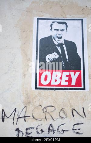 1 mai 2023 le président Macron Graffiti à Paris le jour des émeutes de Mayday en 2023 Banque D'Images