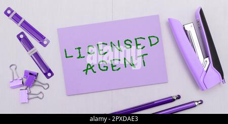 Texte manuscrite Agent autorisé, vitrine commerciale Vendeur autorisé et accrédité de polices d'assurance Banque D'Images