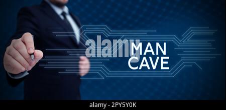 Écriture affichant le texte Man Cave. Mot écrit sur une pièce, un espace ou une zone d'un logement réservé à un homme Banque D'Images