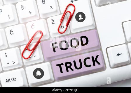 Affiche textuelle indiquant le camion alimentaire. Approche commerciale un grand véhicule avec des installations pour la cuisine et la vente de nourriture Banque D'Images